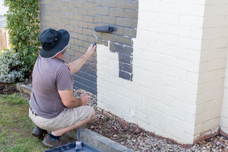 Local Exterior Repair And Painting pros at work